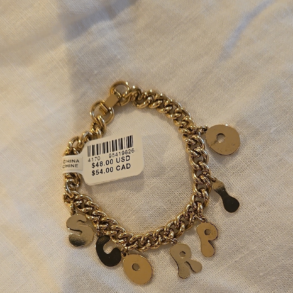 Gold Charm Bracelet with Elegant Design